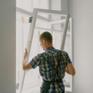 Person installing a window